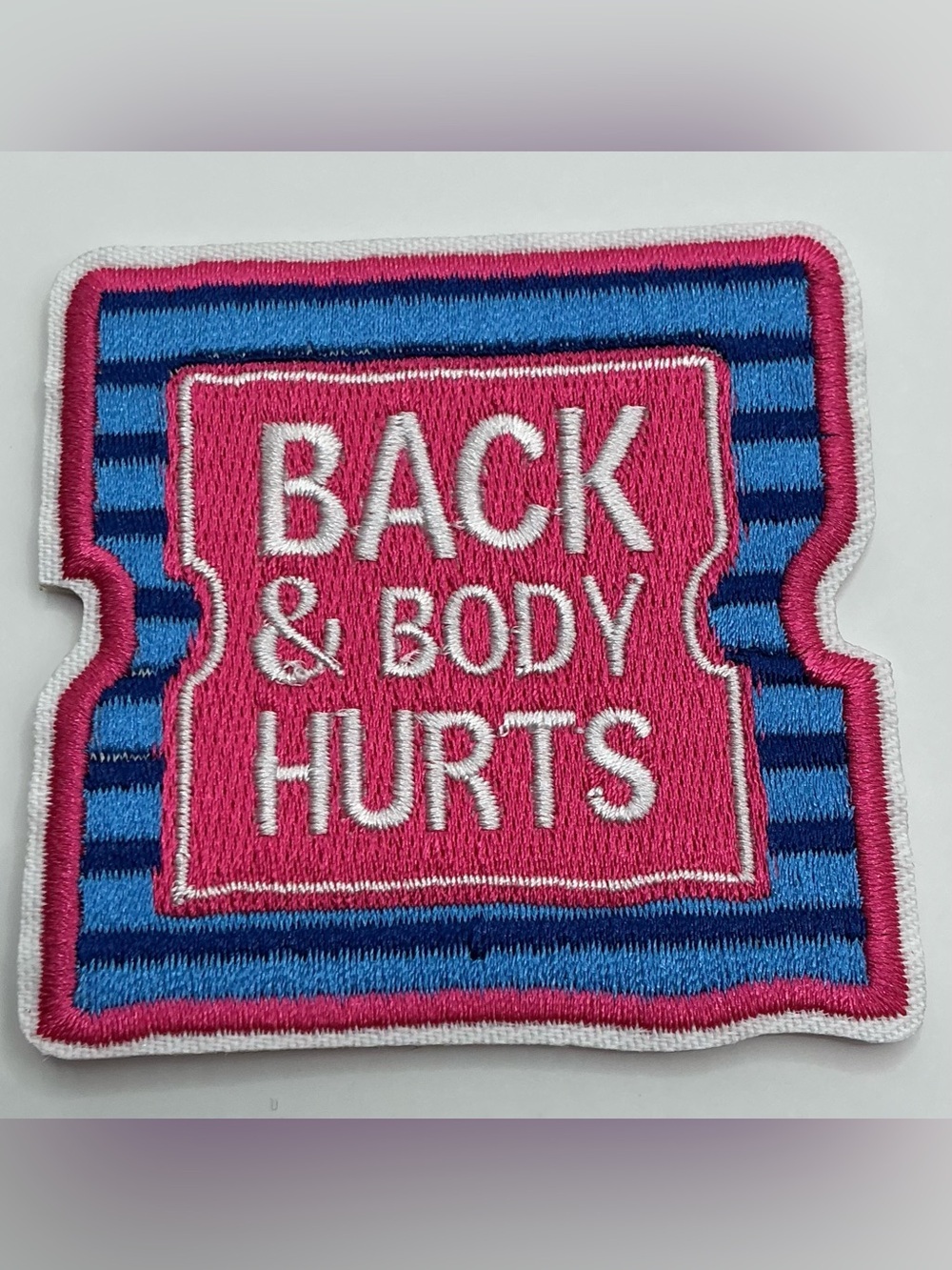 EMBROIDERED IRON OR SEW ON PATCH BACK AND BODY HURTS